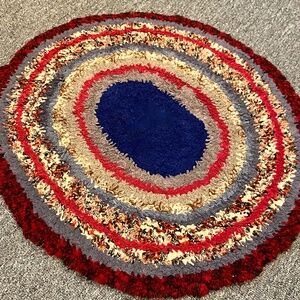 Vintage Handmade Oval Braided Rag Rug. 23"by 25"